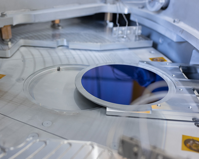 Placement of an 8" Si wafer on the system.
